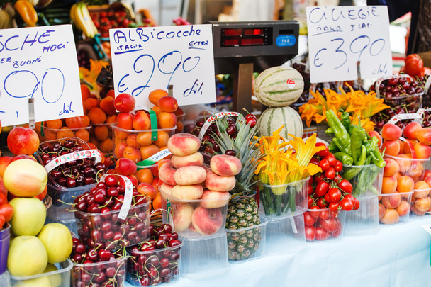 Vegetables and fruits at market - Фото, изображение
