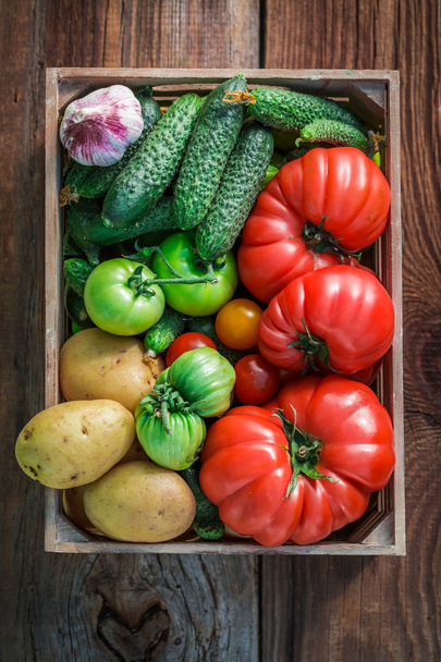 Ripe vegetables in wooden box - Fotoğraf, Görsel