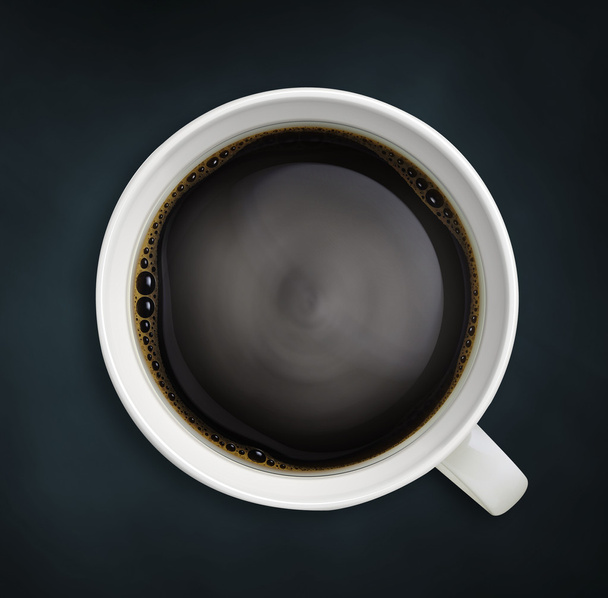 Šálek kávy na černý dřevěný stůl - Fotografie, Obrázek