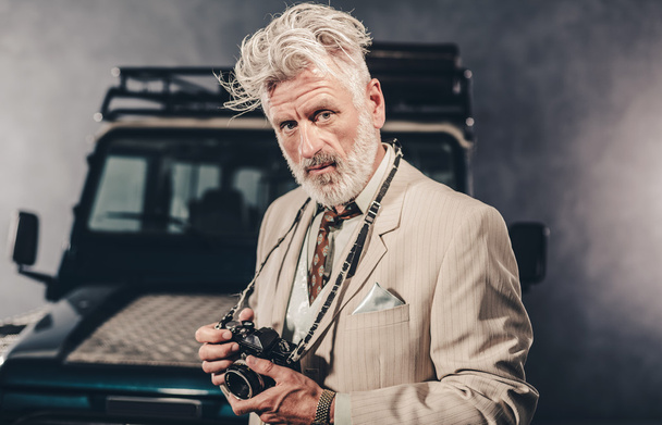 Elegant Man with Camera Against his Vehicle - Fotoğraf, Görsel