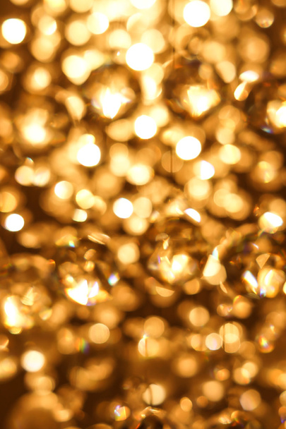 golden bokeh from a chandelier - Photo, Image