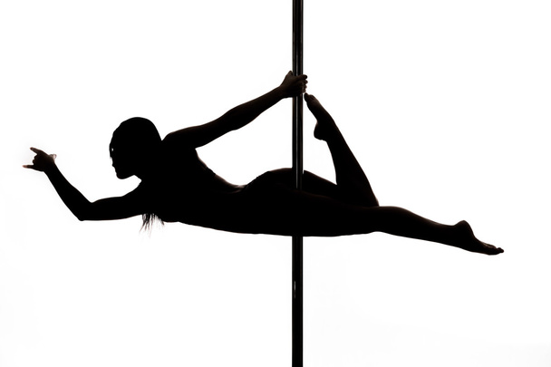 bela jovem mulher exercício pole dance
 - Foto, Imagem
