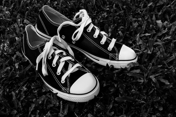 black sneakers with filter effect retro vintage style - Φωτογραφία, εικόνα