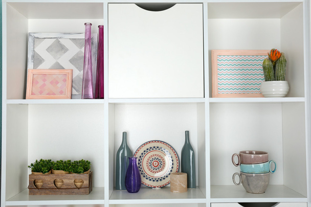 Beautiful white shelves with different home objects - Φωτογραφία, εικόνα