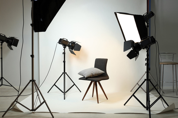 Photo studio with modern interior and lighting equipment - Foto, immagini