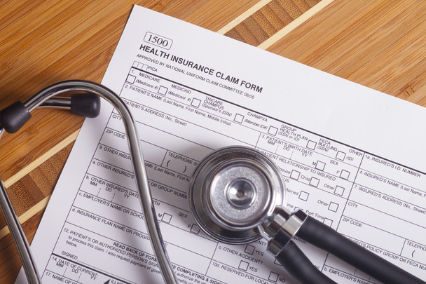 Registros médicos del seguro, pluma y estetoscopio
 - Foto, Imagen