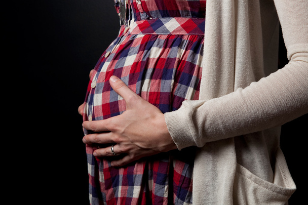 Pregnant belly - Фото, изображение