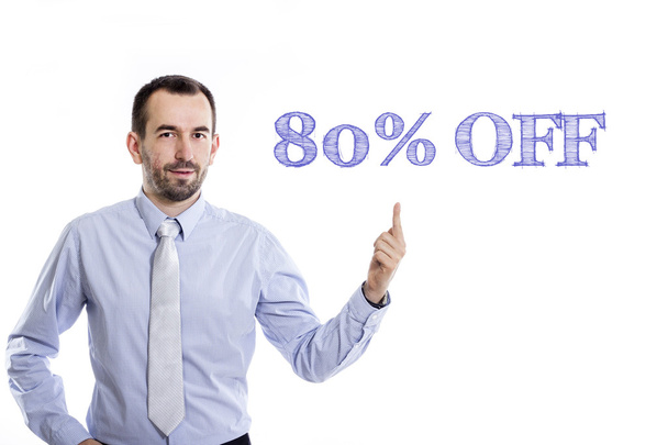 80 percent off  - Young businessman pointing up - Photo, Image