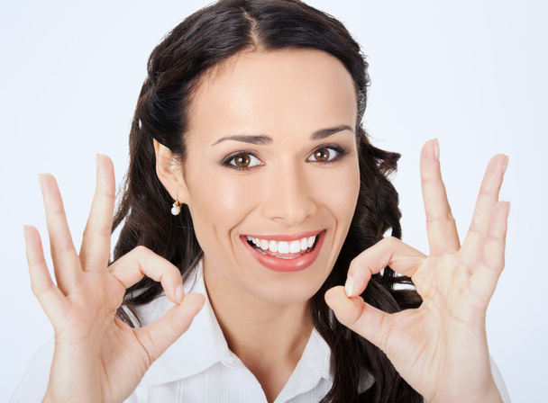 Businesswoman showing okay gesture - 写真・画像
