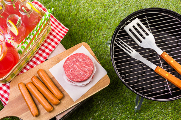 Summer picnic with small charcoal grill - Photo, Image
