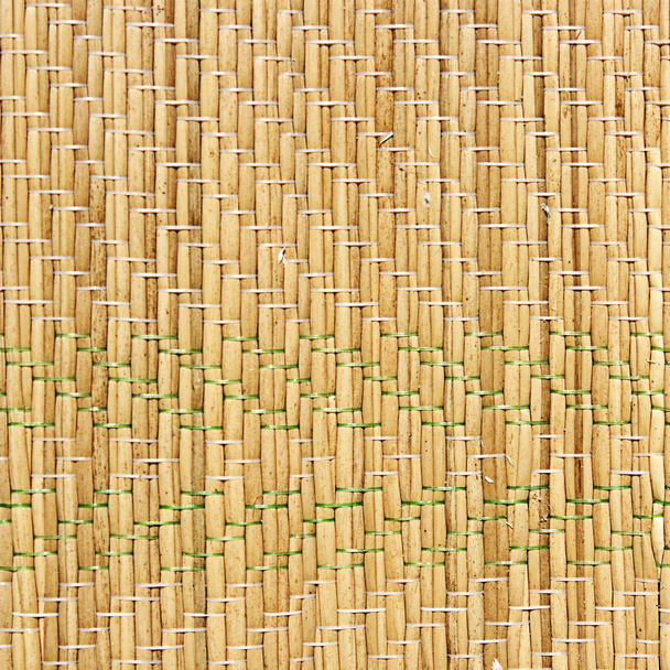 Straw mat texture of a rush matting for the sand. - Photo, Image
