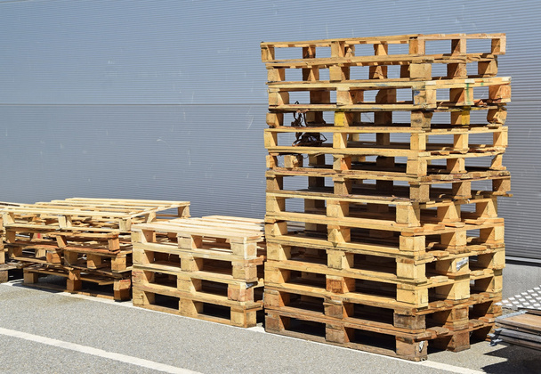 Pallets next to the warehouse - Photo, Image