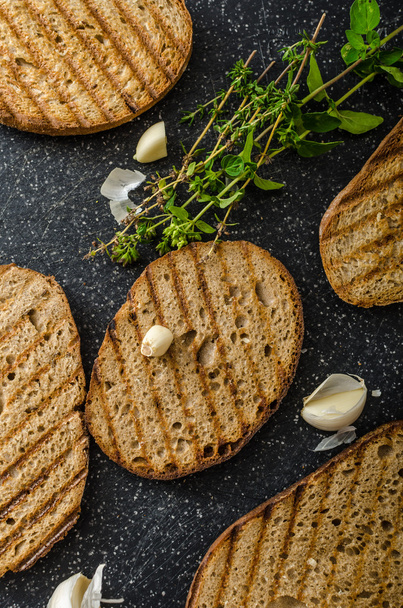 Toasts bread panini with garlic - 写真・画像