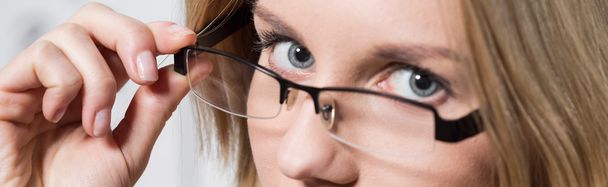 Intelligent woman wearing designed spectacles - Фото, зображення