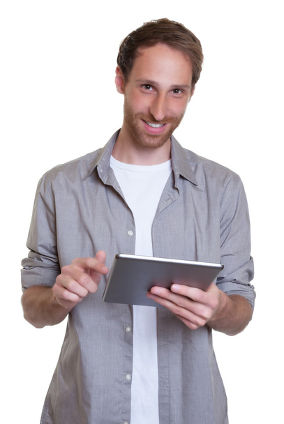 German guy working with tablet computer - Φωτογραφία, εικόνα