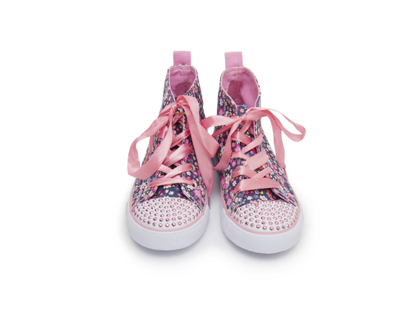 Coppia di scarpe sportive rosa su sfondo bianco
 - Foto, immagini