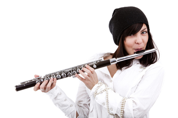 Girl playing on flute - 写真・画像