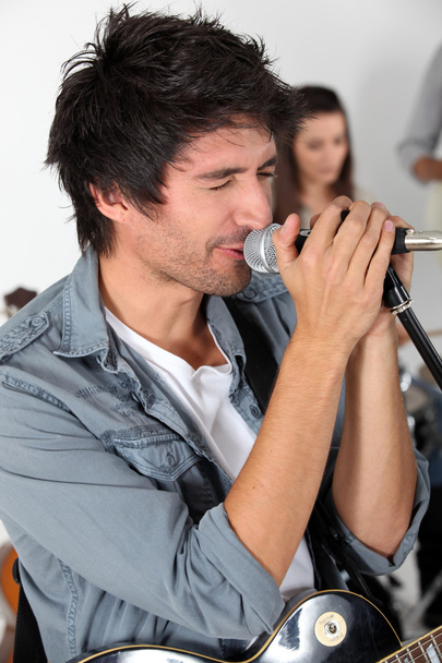 Male vocalist in a rock band - Φωτογραφία, εικόνα