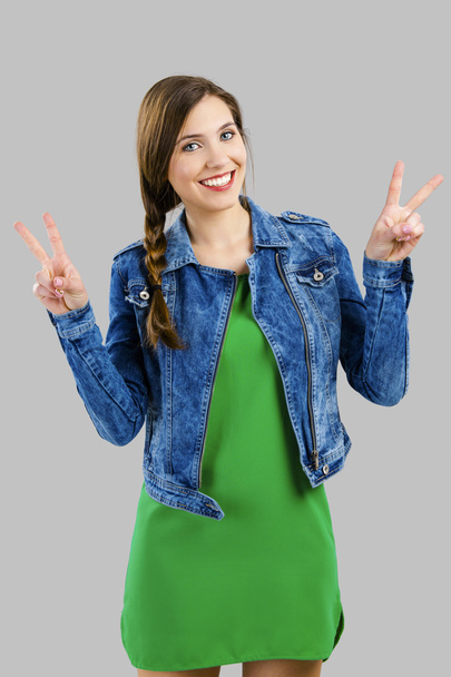 Happy woman with fingers up - Photo, Image