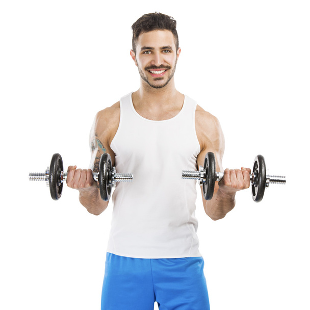 Athletic man lifting weights - Fotó, kép
