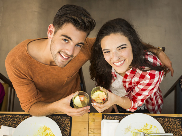 Young couple toasting - Foto, Imagen