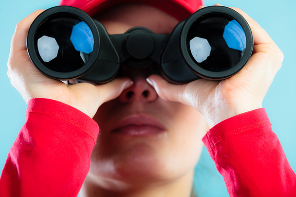 girl looking through binoculars - Foto, immagini