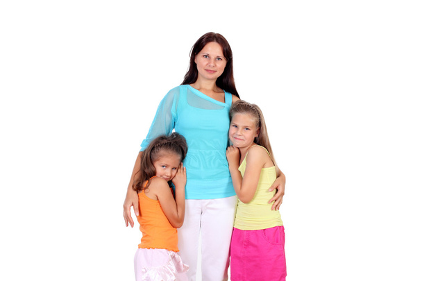Mother with her two daughters in studio - Photo, Image