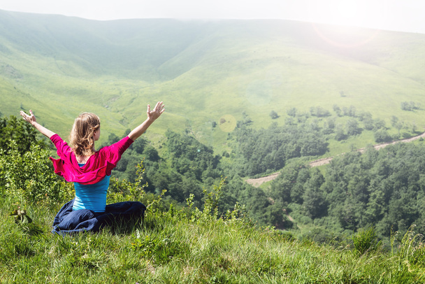 Woman Meditate at the Mountains - Photo, Image
