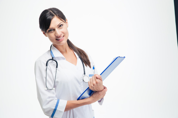 Medical doctor holding clipboard - Фото, зображення