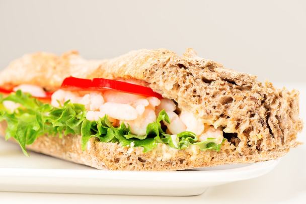 Prawn sandwich on white plate - Valokuva, kuva