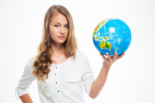 Young beautiful girl holding globe - Foto, imagen