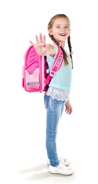 Smiling schoolgirl with backpack saying good bye - Fotoğraf, Görsel