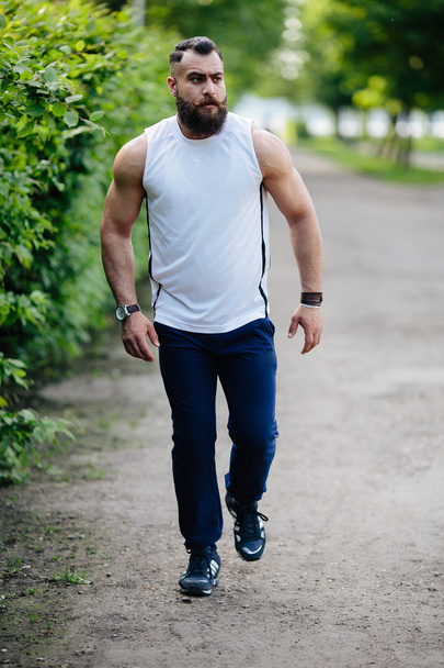 bearded man runs - Photo, Image