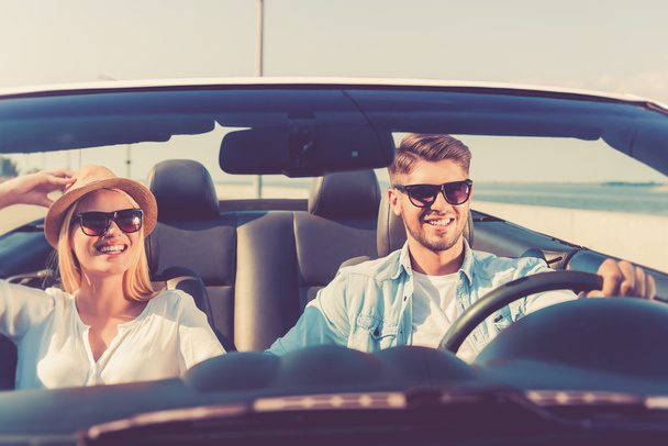 couple riding in their convertible - Photo, image