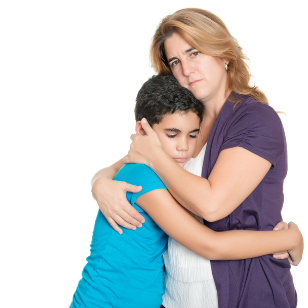 Sad mother hugging her son isolated on white - Foto, Imagen