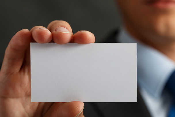 Businessman in suit and hand holding blank calling card - Foto, Bild