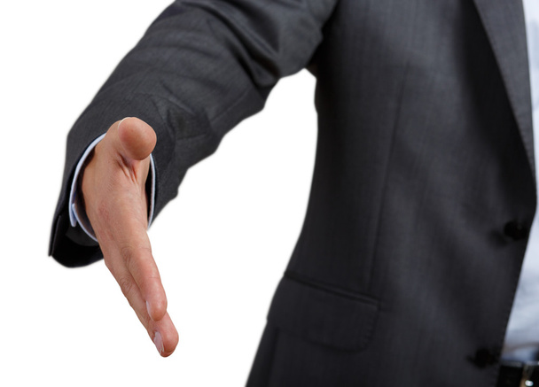 Homme d'affaires en costume et cravate offrant la main à secouer
 - Photo, image