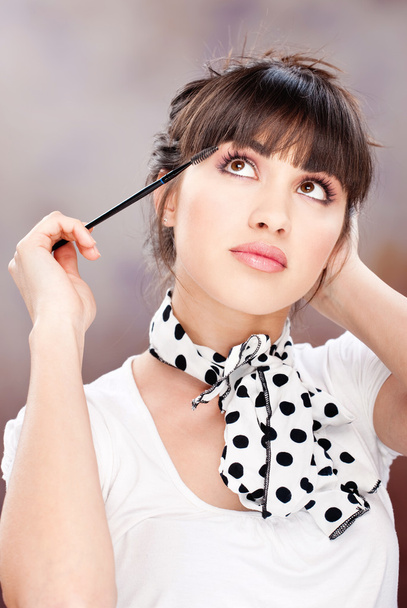 Woman and cosmetic makeup - Foto, Bild