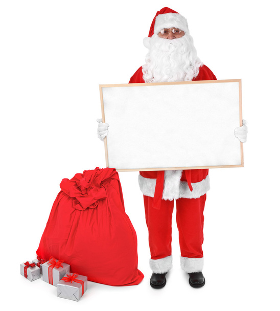 Santa claus and empty board - Photo, Image