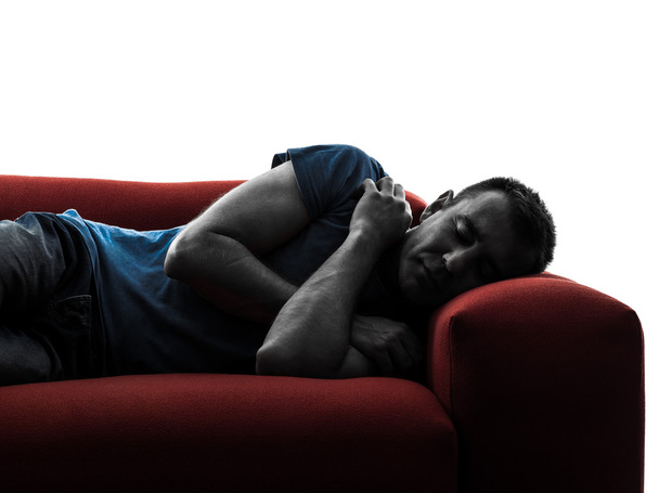 man sofa coach sleeping - 写真・画像