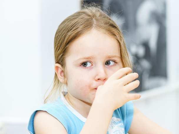Cute little girl close-up indoor portrait - Φωτογραφία, εικόνα