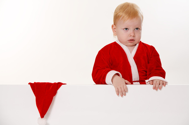 Joulupukiksi pukeutunut lapsi
 - Valokuva, kuva