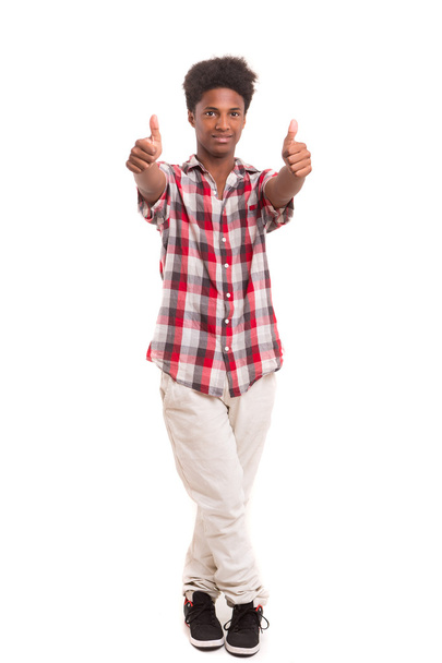 Casual Boy gesturing thumbs up sign - Photo, Image