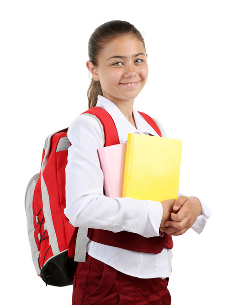Beautiful little girl in school uniform isolated on white - Zdjęcie, obraz