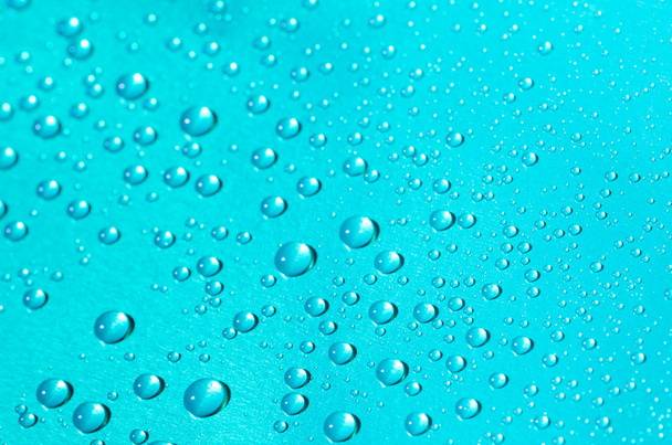 kapky vody na modrém pozadí - Fotografie, Obrázek