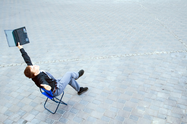 Businessman sitting at the street - Foto, Imagem