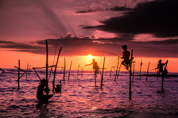 pescadores tradicionales en palos
 - Foto, imagen