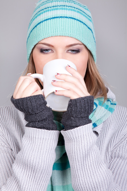 Winter girl drinking tea - Photo, Image