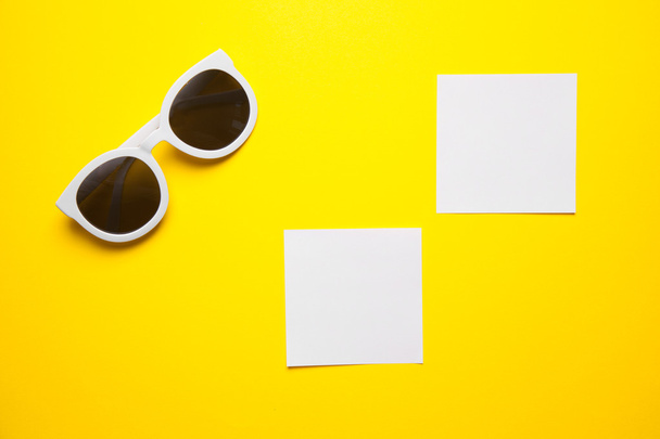 White sunglasses with white paper frames - Foto, Imagem