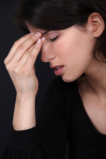 Woman with a headache - Fotografie, Obrázek